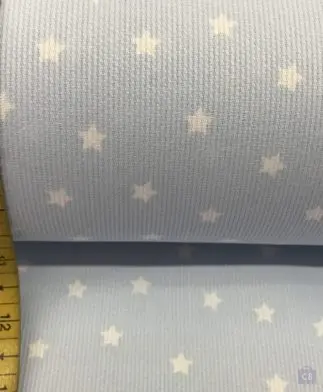 Tela Piqué de Canutillo Azul con Estrellas en Color Blanco con cinta métrica como referencia - Conchi Berguño