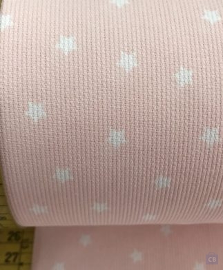 Tela Piqué de Canutillo Rosa con Estrellas en Color Blanco con cinta métrica como referencia - Conchi Berguño