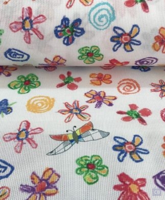 Tela Piqué de Canutillo Mariposas en Blanco con Dibujos Multicolor - Detalle dela Pieza - Conchi Berguño