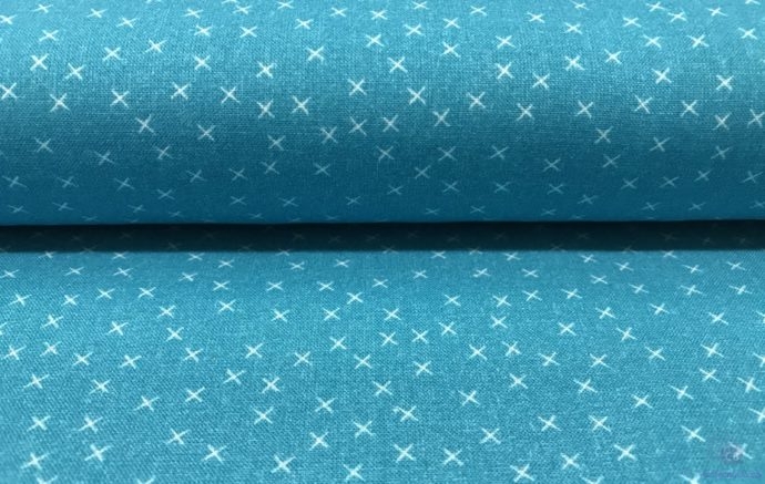 Tela de Patchwork Safari Azul con Pequeñas Cruces Blancas - Detalle de la Pieza - Conchi Berguño