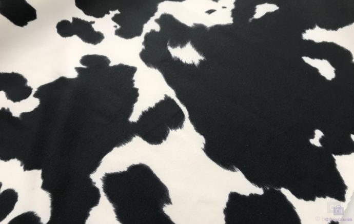 Tela de tapicería sin pelo imitando piel de vaca blanca y negra - Conchi Berguño